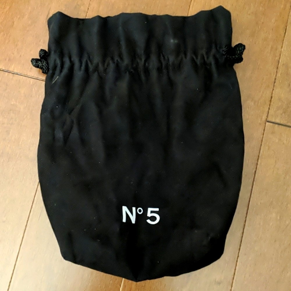 Chanel N° 5  Drawstring Black  With Satin interior Bag.